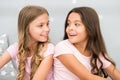 Girls sisters spend pleasant time communicate in bedroom. Awesome perks of having sister. Sisters older or younger major Royalty Free Stock Photo