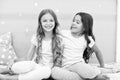 Girls sisters spend pleasant time communicate in bedroom. Sisters older or younger major factor in siblings having more Royalty Free Stock Photo