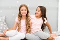 Girls sisters spend pleasant time communicate in bedroom. Sisters older or younger major factor in siblings having more Royalty Free Stock Photo