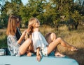 Girls plaiting pigtails