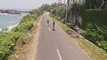 Girls Skating Ocean aerial slow motion