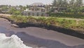 Girls Skating Ocean Cliff aerial slow motion