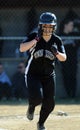 Girls softball - batter runs to first