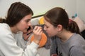 Girls spending time by doing make up Royalty Free Stock Photo