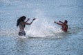 girls squirting water