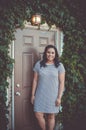 Girl, Doorway, Ivy, Lamp Royalty Free Stock Photo