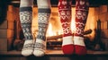 Girls standing in front of fireplace in winter sweaters wearing. Feet in wool socks near fireplace Royalty Free Stock Photo