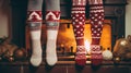 Girls standing in front of fireplace in winter sweaters wearing. Feet in wool socks near fireplace Royalty Free Stock Photo