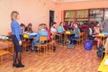 Girls students in classroom with teacher in the class