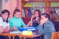 Girls students in the classroom at their desks