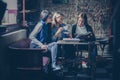 Girls students having fun in cafe. Royalty Free Stock Photo