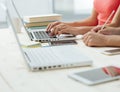 Girls studying at desk and doing homeworks Royalty Free Stock Photo