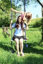 Girls swinging on swing Royalty Free Stock Photo