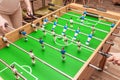 girls take a break and play table football and have fun