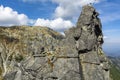 The girls take a souvenir photo after completing the climb to the popular peak of the Monk Mnich in the Polish Tatras