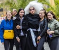 Girls taking a photo with a girl dressed as a drag queen nun at the Christopher Street Day CSD in Munich, Germany.