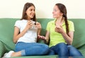 Girls talking on a couch