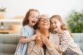 Girls and their grandmother Royalty Free Stock Photo