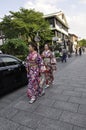 Kyoto, 13th may: Girls in Kimono walking in Gion or Geisha district from Kyoto City in Japan Royalty Free Stock Photo