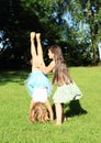 Girls training handstand Royalty Free Stock Photo