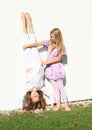 Girls training handstand Royalty Free Stock Photo