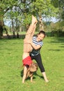 Girls training handstand Royalty Free Stock Photo