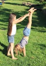 Girls training handstand Royalty Free Stock Photo