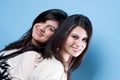 Girls on turquoise background Royalty Free Stock Photo
