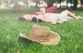 Girls unfocused relax in summer park, young hippie friends leisure Royalty Free Stock Photo
