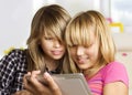 Girls using touchpad Royalty Free Stock Photo