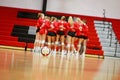 Girls Volleyball Team in Strategy Huddle Royalty Free Stock Photo