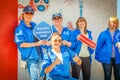 girls volunteers, in branded clothes, for the 2018 FIFA World Cup on a sunny summer day.