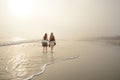 Girls walking, enjoying time together on the beach Royalty Free Stock Photo