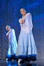 Girls in white dresses dancing on stage, Russian National Dance