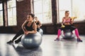 Girls working out at a gym with the gymball Royalty Free Stock Photo