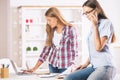 Girls working and talking on phone Royalty Free Stock Photo