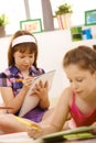 Girls writing homework Royalty Free Stock Photo