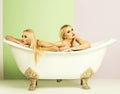 Young couple foreplay lying in tub, intimacy lovers, women Royalty Free Stock Photo