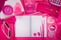 Girly pink desktop and stationery Royalty Free Stock Photo