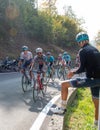 Giro di lombardia group cyclists engaged in the ascent of dossena