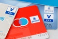 Girocards with maestro and v pay payment option. Selective focus on girocard word on sign logo. German bank cards Royalty Free Stock Photo