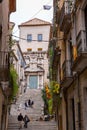 Beautiful steps and archway of the Pujada de Sant Domenec located in the Jewish Quarter of Girona, Spain Royalty Free Stock Photo