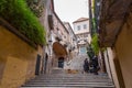 Beautiful steps and archway of the Pujada de Sant Domenec located in the Jewish Quarter of Girona, Spain Royalty Free Stock Photo