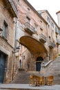 Beautiful steps and archway of the Pujada de Sant Domenec located in the Jewish Quarter of Girona, Spain Royalty Free Stock Photo