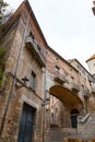 Beautiful steps and archway of the Pujada de Sant Domenec located in the Jewish Quarter of Girona, Spain Royalty Free Stock Photo