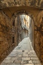 Girona, narrow medieval cobblestone street, old Jewish Quarter