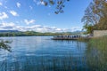 GIRONA, SPAIN - 11 OCTOBER 2020: View of the terrace of a restaurant on a pier on Lake Banyoles Royalty Free Stock Photo
