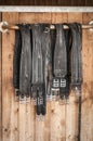 Girths in front of a stable door Royalty Free Stock Photo