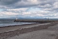 Girvan Bay & Harbour Wall on a Cloudy Day.