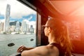 Gitl female woman traveler visit Hong Kong and taking ferry Royalty Free Stock Photo